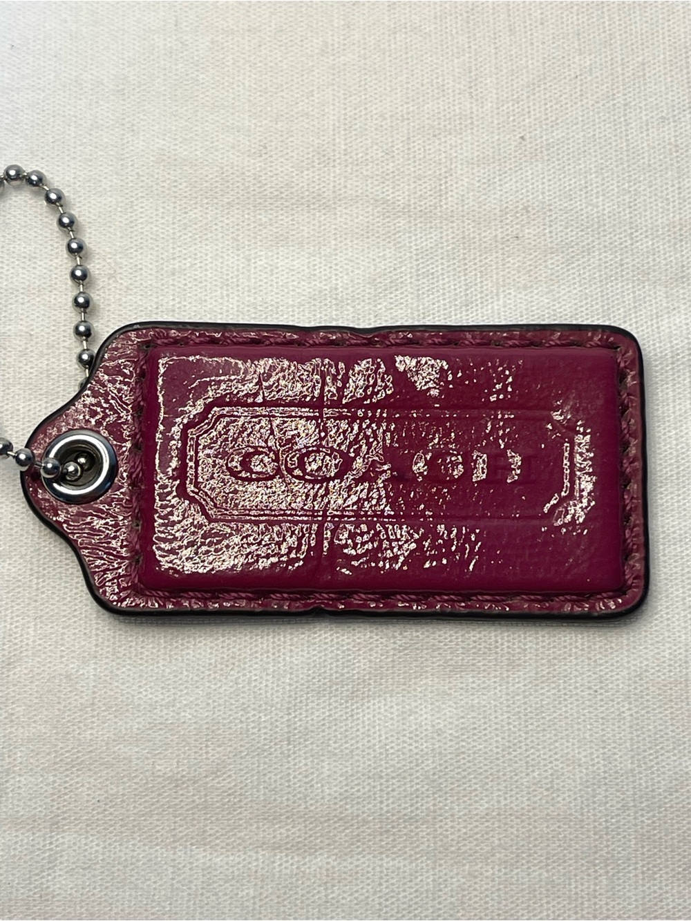 Coach Patent Leather Magenta Hang Tag with Ball Chain